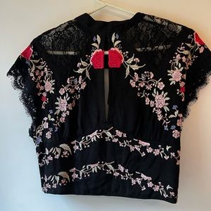 Free people, black rayon top with colorful floral embroidery
